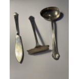 THREE HALLMARKED SILVER ITEMS TO INCLUDE A LONDON BUTTER KNIFE, AND A SHEFFIELD BABY SPOON AND