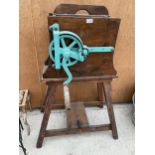 A VINTAGE WOODEN PULPER/JUICER WITH CAST IRON MECHANISM IN WORKING ORDER