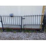 A PAIR OF WROUGHT IRON GARDEN GATES (L:7FT 3" H:3FT 9")