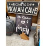 TO ILLUMINATED SIGNS TO INCLUDE 'KITCHEN OPEN' AND 'WOMAN CAVE'