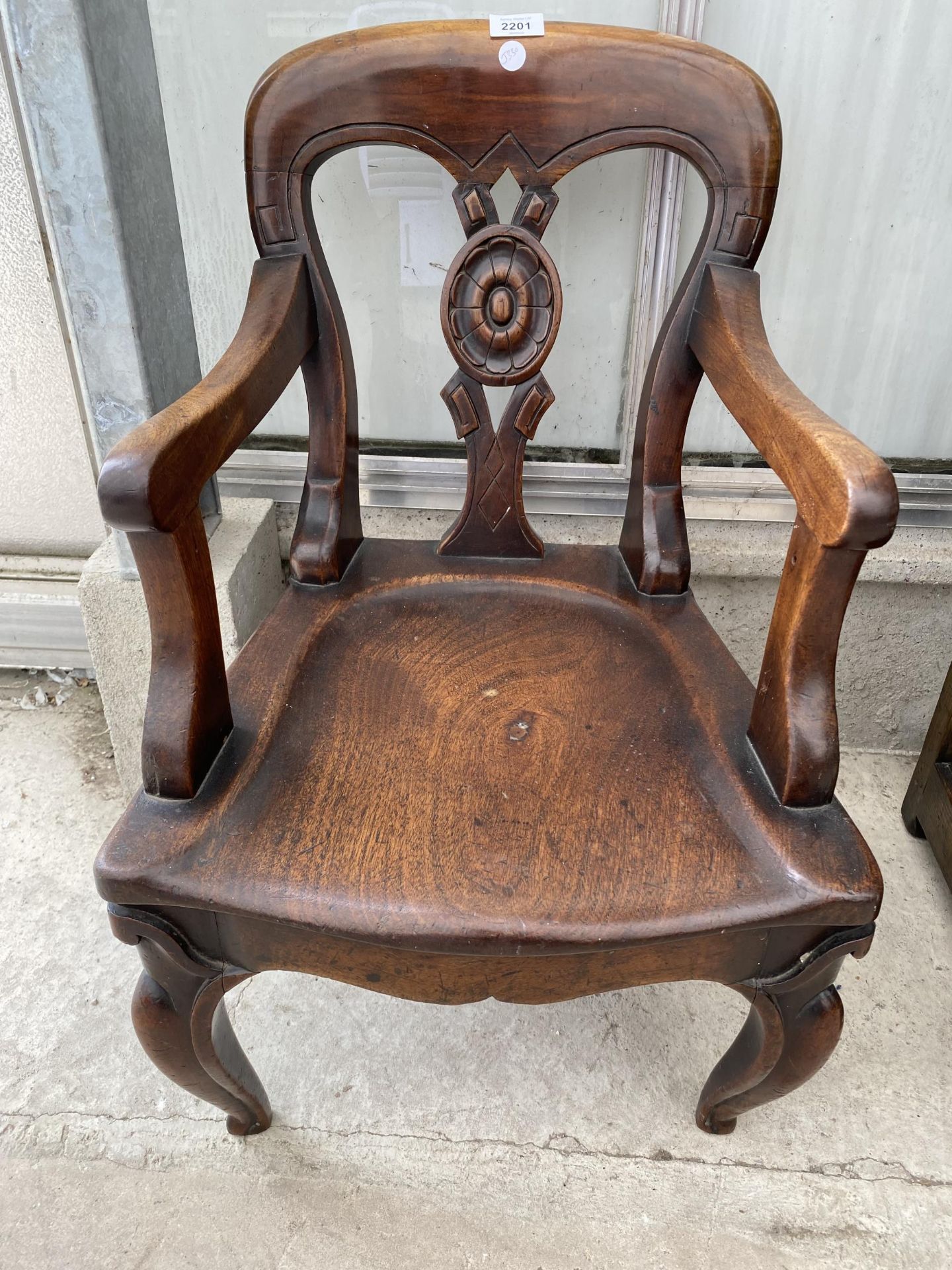 A VICTORIAN MAHOGANY CHILD'S ELBOW CHAIR WITH FRONT CABRIOLE LEGS