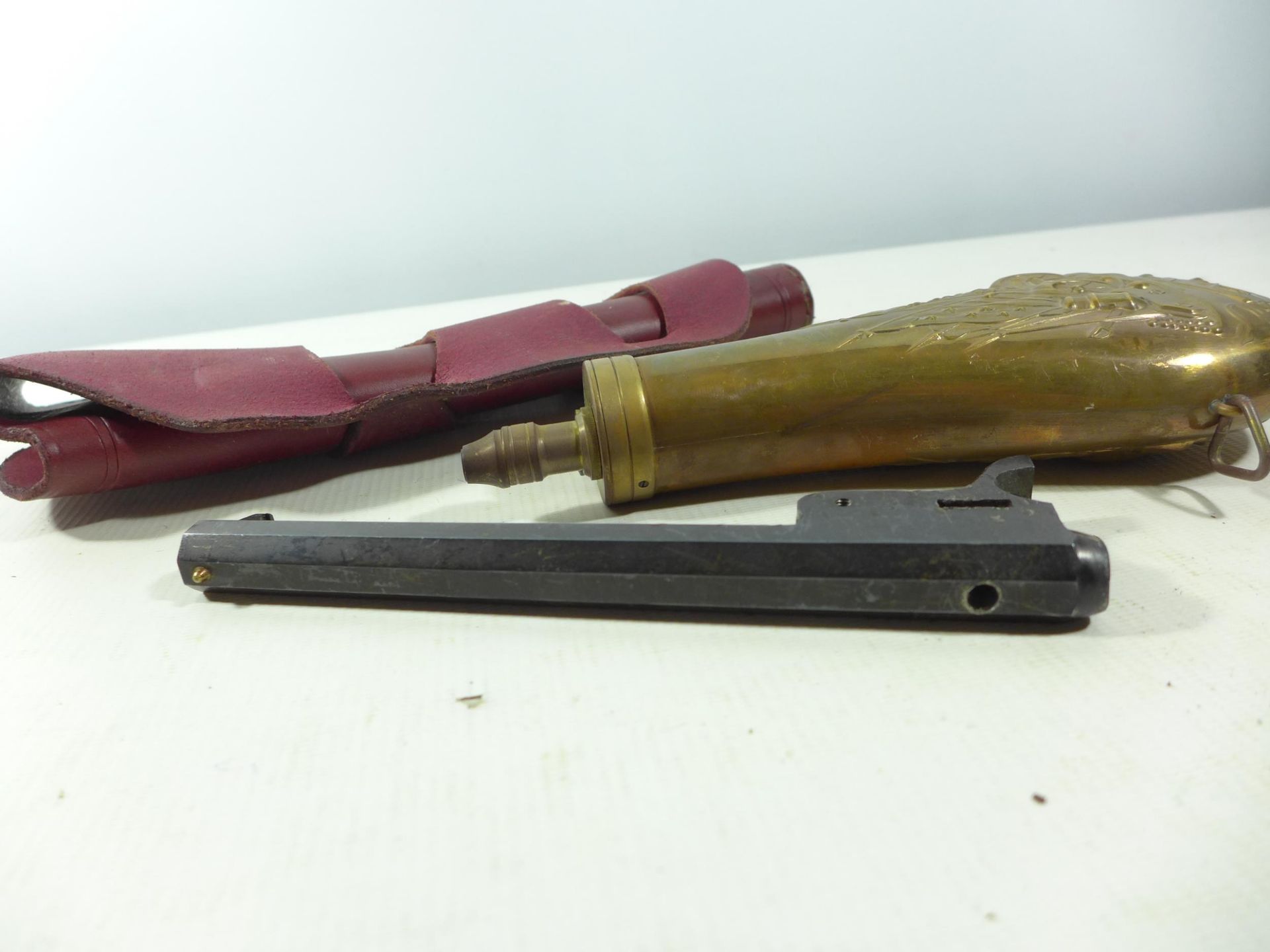 A COPPER AND BRASS POWDER FLASK, LEATHER HOLSTER AND A BLOCKED NAVY COLT BARREL (3) - Image 3 of 3