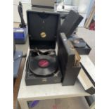 A CONCORD WIND UP GRAMAPHONE AND AN ASSORTMENT OF RECORDS