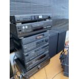 A LARGE QUANTITY OF STEREO ITEMS TO INCLUDE A TECHNICS AMPLIFIER, TUNER AND CD PLAYER, A JVC CD