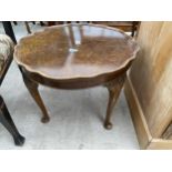 A WALNUT COFFEE TABLE WITH PIE CRUST RIM ON CABRIOLE LEGS 23" DIAMETER