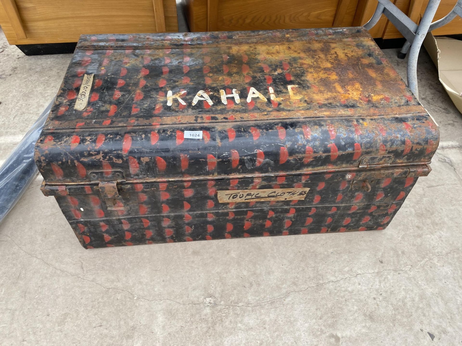 A LARGE VINTAGE METAL TRAVEL TRUNK