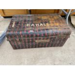 A LARGE VINTAGE METAL TRAVEL TRUNK