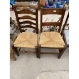 TWO ELM LADDER BACK DINING CHAIRS WITH RUSH SEATS