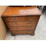 A 19TH CENTURY STYLE SMALL CHEST OF FOUR GRADUATED DRAWERS 24.5" WIDE