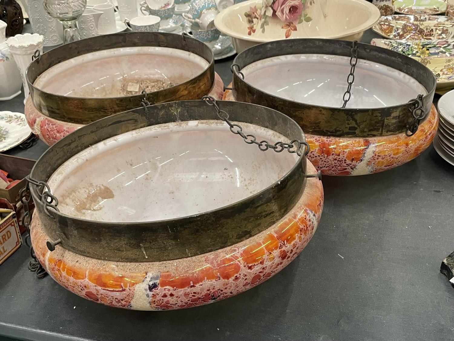 THREE LARGE RETRO CEILING LIGHT SHADES IN MOTTLED ORANGE, RED AND CREAM WITH HANGING CHAINS DIAMETER
