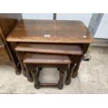 A MID 20TH CENTURY NEST OF THREE TABLES