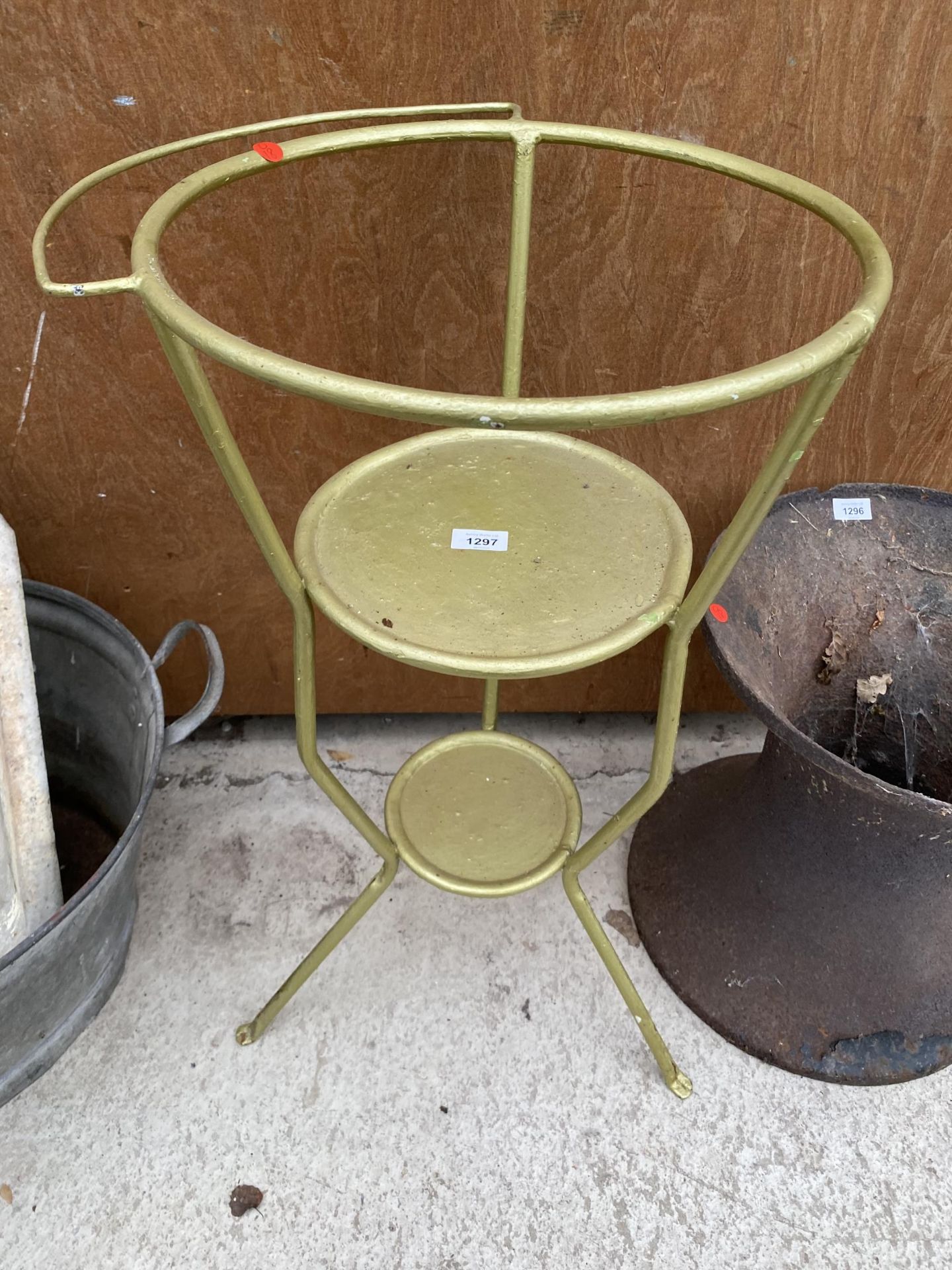 A GOLD PAINTED METAL TWO TIER PLANT STAND