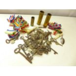 THREE BRASS SHELL CASES, HEIGHTS 7CM TO 11CM, MEDAL RIBBONS, KEYS ETC