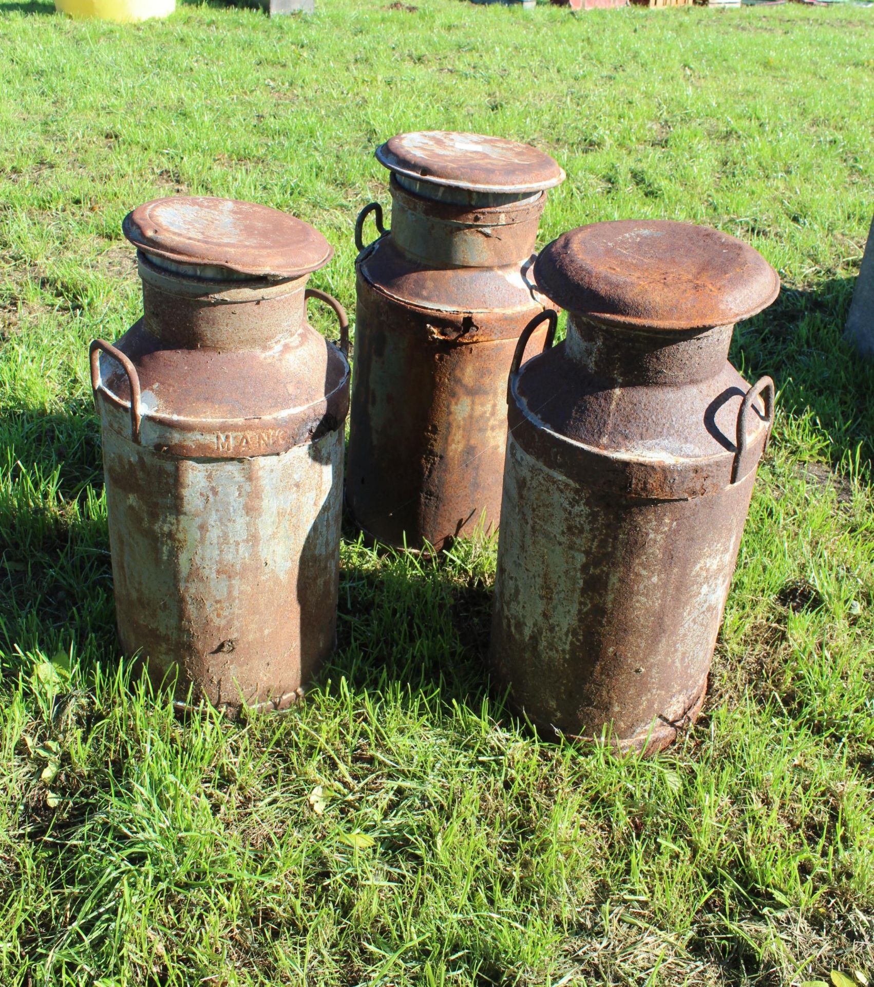 3 MILK CHURNS WITH LIDS -UNITED CO-OP DAIRIES ETC + VAT - Image 2 of 2