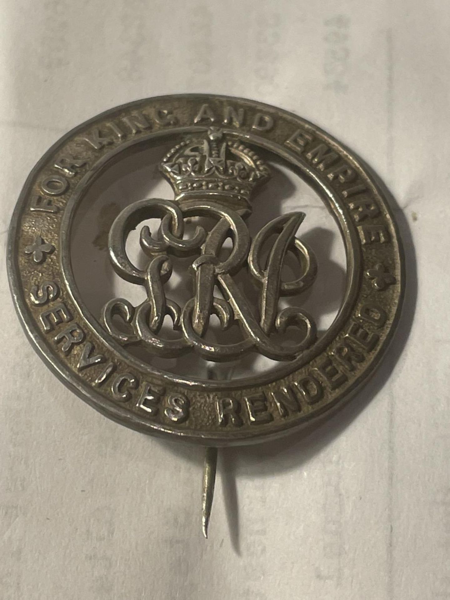 A FOR KING AND EMPIRE SERVICES RENDERED PIN BADGE