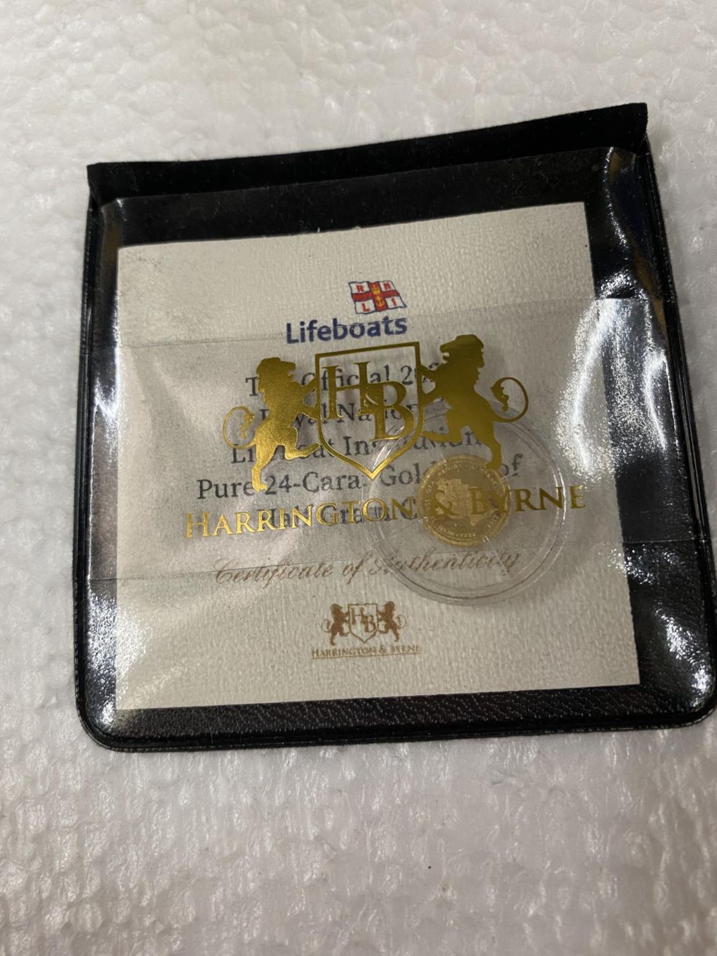 ALDERNEY , CI “THE OFFICIAL 2021 RNLI” A 24 CARAT GOLD PROOF COIN WITH COA . THE COIN WEIGHS 0.5