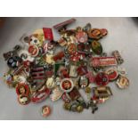 A LARGE QUANTITY OF MANCHESTER UNITED FOOTBALL CLUB BADGES (OVER 100)