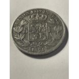 A COIN MARKED 1871 LEOPOLD II