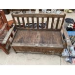 A WOODEN GARDEN BENCH WITH UNDER SEAT STORAGE