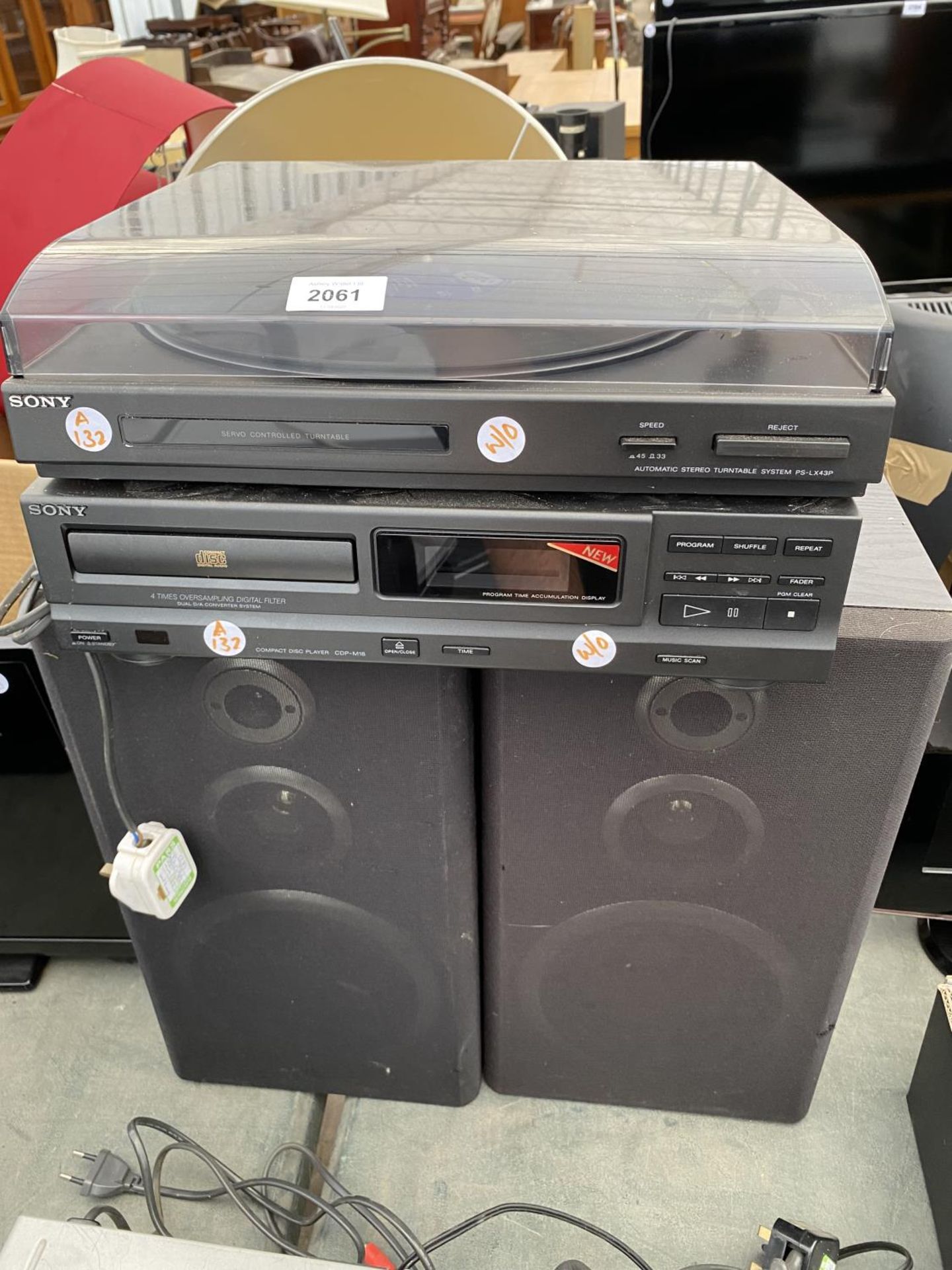 A SONY RECORD PLAYER AND A SONY CD PLAYER WITH TWO WOODEN CASED SPEAKERS