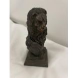 A SMALL BRONZE STATUE OF A LION