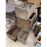 A VINTAGE TEACHEST, THREE MONOGRAMED WOODEN BOXES AND AN ASSORTMENT OF GLASS BOTTLES ETC