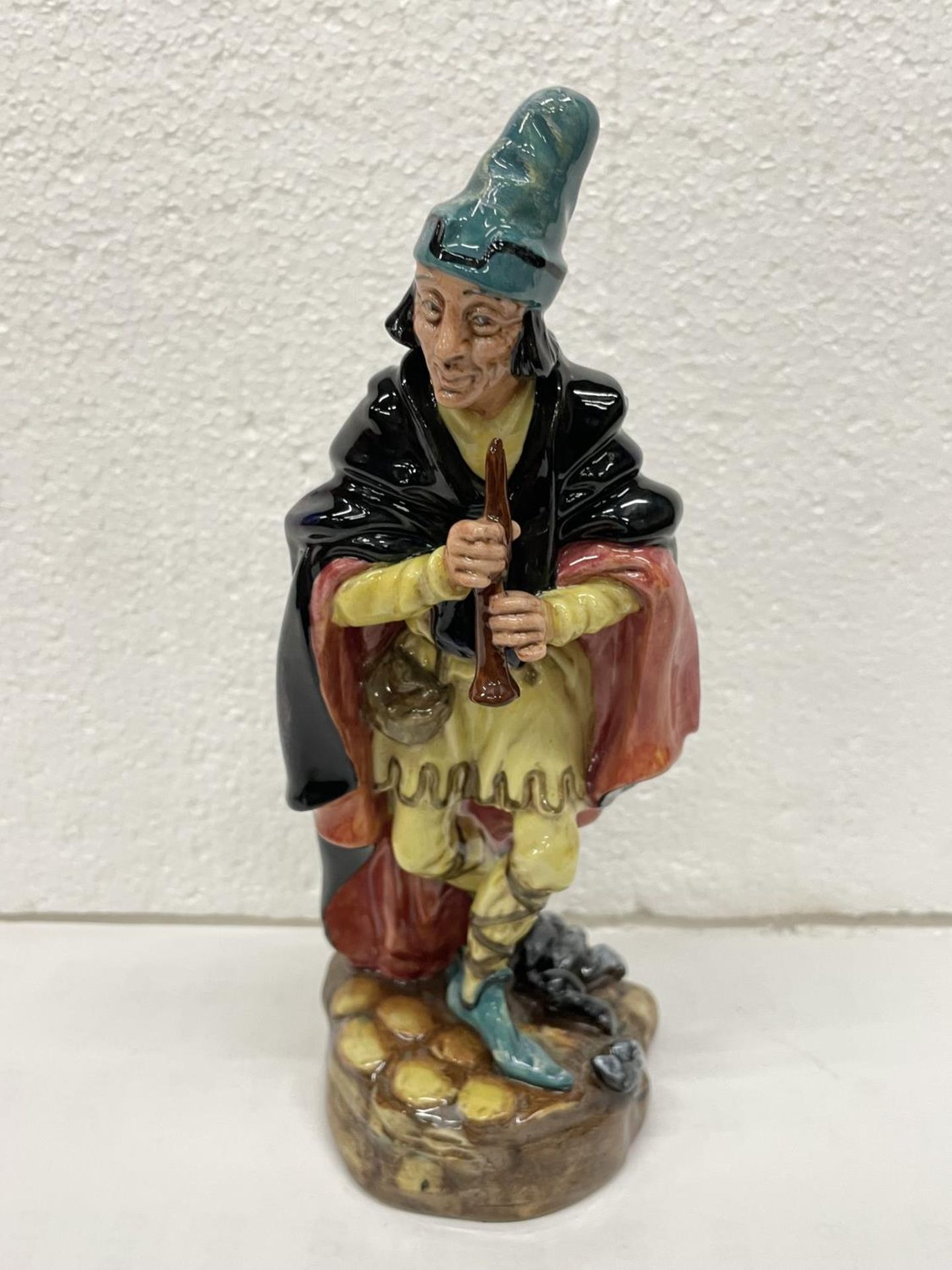 A ROYAL DOULTON FIGURE THE PIED PIPER HN 2102