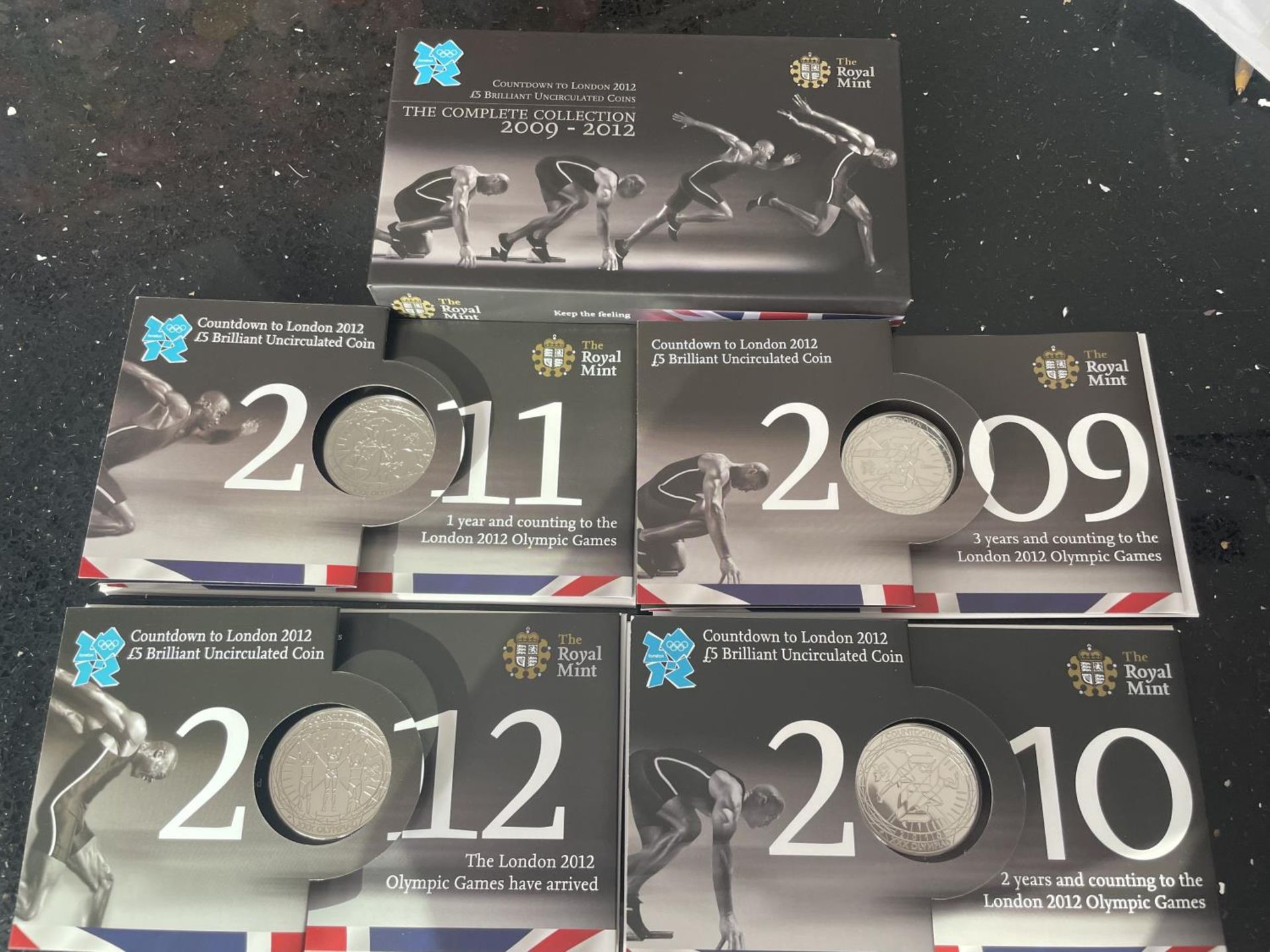 THE COMPLETE COLLECTION “COUNTDOWN LONDON 2012” 4 X £5 BRILLIANT, UNCIRCULATED COINS