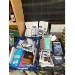 A LARGE ASSORTMENT OF NEW PHONE CASES TO INCLUDE IPHONE AND SAMSUNG