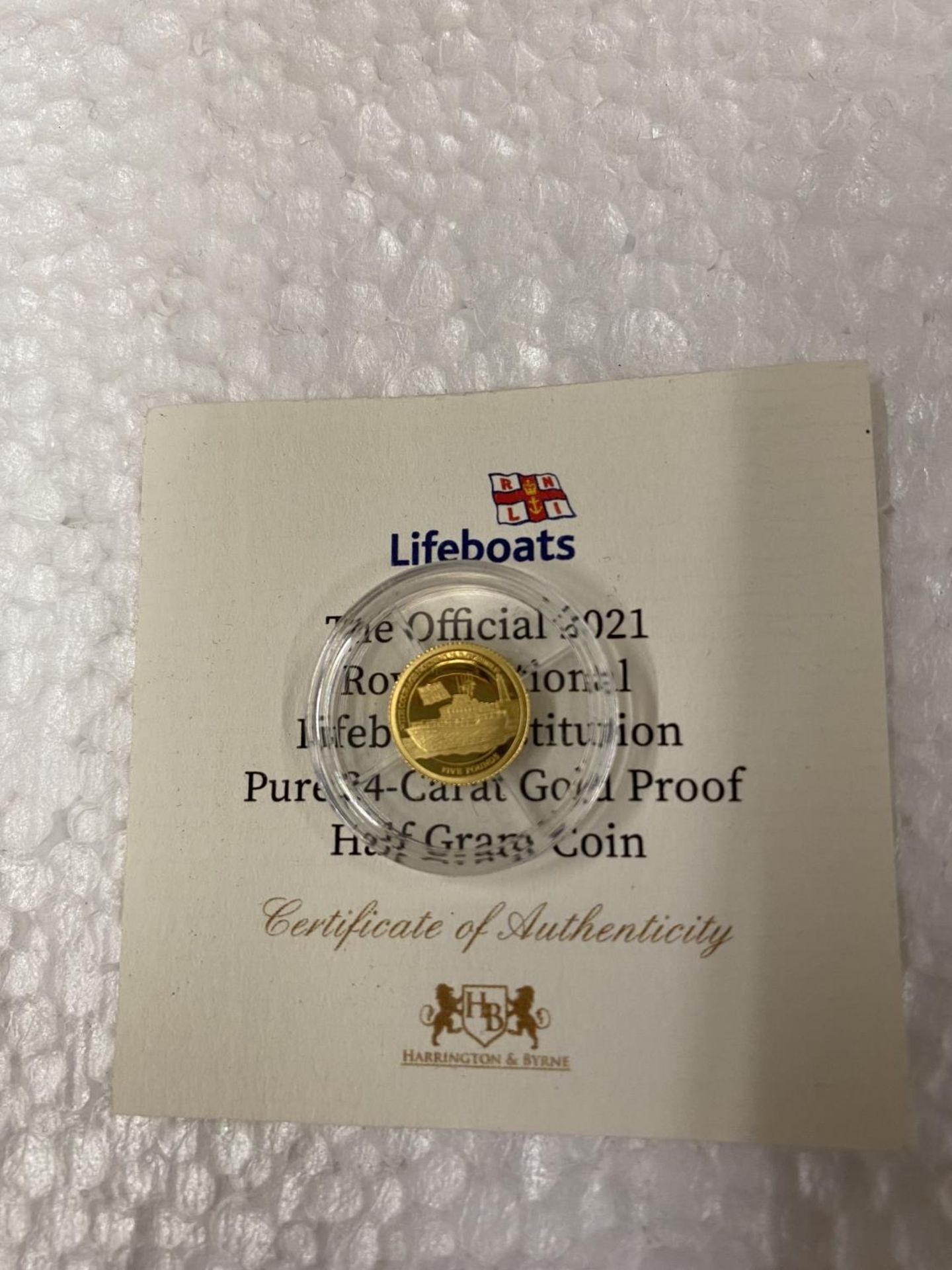 ALDERNEY , CI “THE OFFICIAL 2021 RNLI” A 24 CARAT GOLD PROOF COIN WITH COA . THE COIN WEIGHS 0.5 - Image 3 of 3