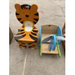A CHILDRENS CHAIR AND A CHILDS ROCKING ANIMAL