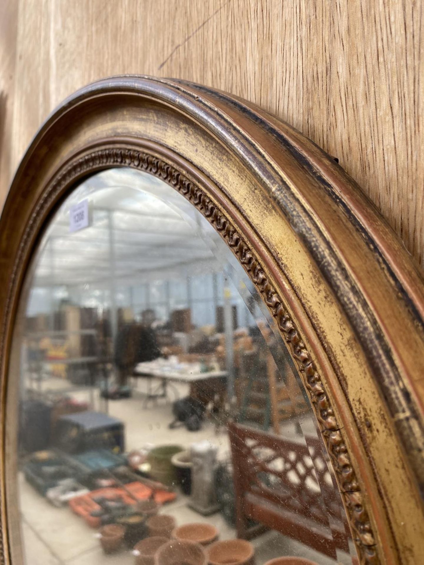 A GILT FRAMED CIRCULAR BEVELED EDGE WALL MIRROR - Image 2 of 3