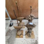 FOUR VINTAGE CAST IRON BALL AND CLAW FURNITURE FEET ( TWO PAIRS)