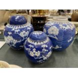 THREE ORIENTAL STYLE PORCELAIN PRUNUS GINGER JARS - ONE A/F TO LID, 1 MISSING LID