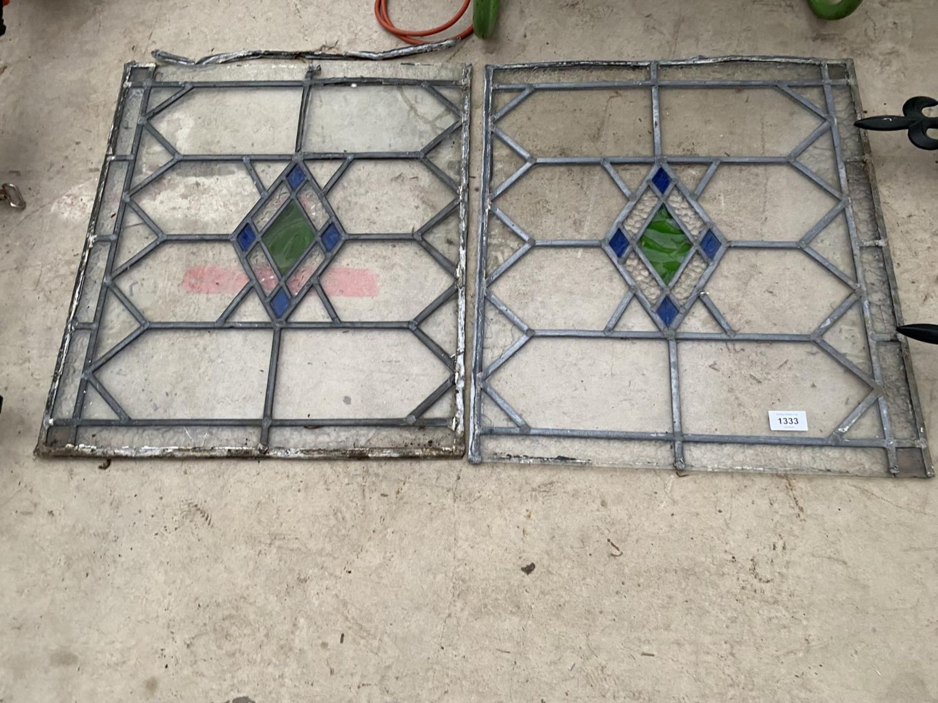 A PAIR OF GLAZED AND LEADED WINDOW PANES