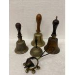 A COLLECTION OF BRASS BELLS TO INCLUDE HAND BELLS, ETC