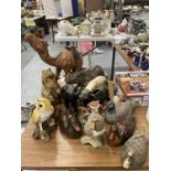 A QUANTITY OF ANIMAL FIGURES TO INCLUDE A CAMEL, BEARS, OWLS, DUCKS, ETC