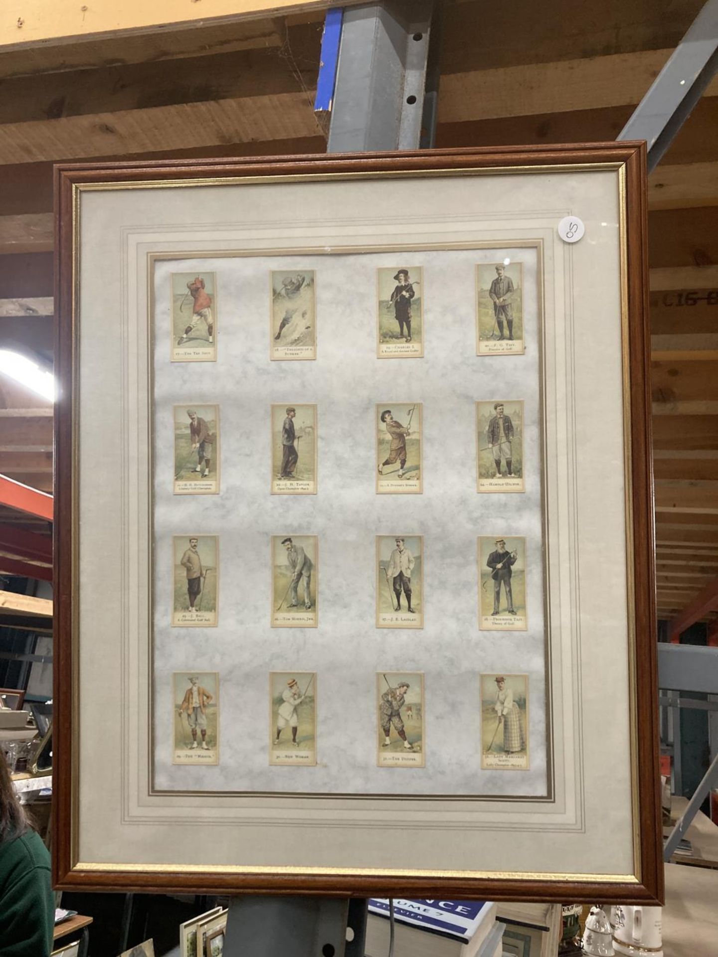 A FRAMED SET OF VINTAGE GOLFING CIGARETTE CARDS