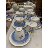 A WINDSOR CHINA 'WINDSWEPT' PART TEASET TO INCLUDE CUPS, SAUCERS, SIDE PLATES, CREAM JUG AND SUGAR