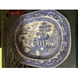 A LARGE VICTORIAN BLUE AND WHITE WILLOW PATTERN SERVING PLATTER 53CM X 43CM