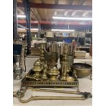 A QUANTITY OF BRASS ITEMS TO INCLUDE INKWELLS, CANDLESTICKS - ONE BEING TRENCH ART - PLANTERS, A