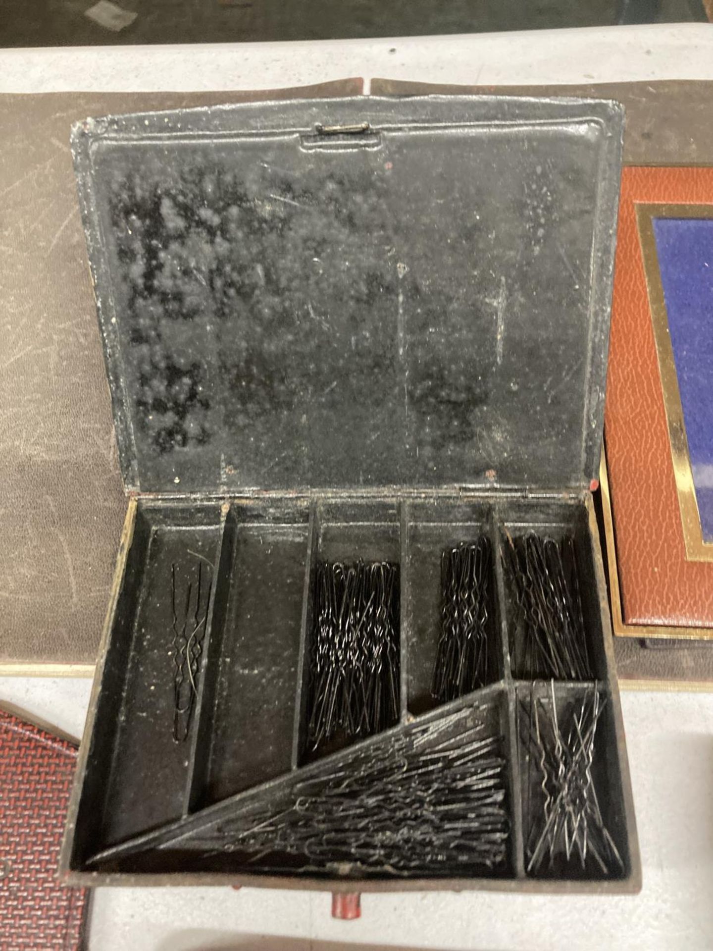 A VINTAGE LEATHER BOUND BLOTTER PAD, TWO METAL BOX ES, ONE WITH A PAINTED TOP, THE OTHER HAVING AN - Image 2 of 4