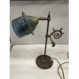 A VINTAGE BRASS TABLE LAMP WITH ADJUSTABLE BLUE/GREEN GLASS SHADE