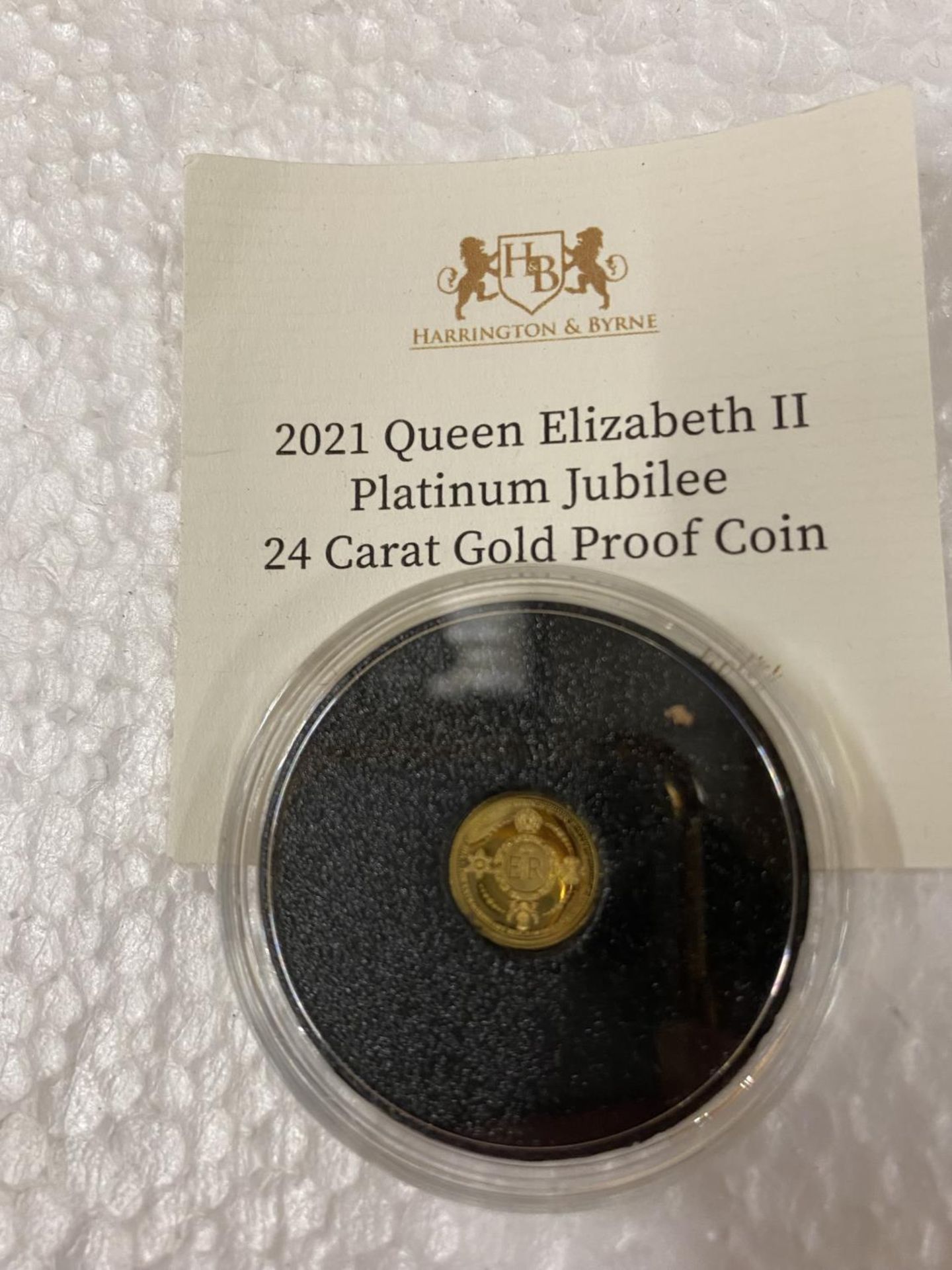 SOLOMON ISLANDS “2021 QE11 PLATINUM JUBILEE “ A 24 CARAT GOLD PROOF COIN WITH COA . THE COIN - Image 2 of 3