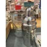 A VINTAGE STYLE STAINLESS STEEL COCKTAIL SHAKER WITH ROTATING RECIPES PLUS A GLASS ICE BUCKET