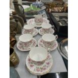 A QUANTITY OF ROYAL ADDERLEY 'DEVONSHIRE ROSES' TO INCLUDE, A CAKE PLATE, CREAM JUG, CUPS AND