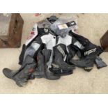 A LADIES SIZE 14 MOTORBIKE JACKET, A GENTS MOTORBIKE JACKET AND TWO PAIRS OF BOOTS