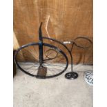 A SMALL PENNY FARTHING PLANT STAND