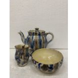 A STUDIO POTTERY SET TO INCLUDE A TEAPOT, SUGAR BOWL AND CREAM JUG - THE TEAPOT BEARING THE NAME MRS