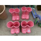 FOUR CERAMIC WELLY PLANTERS